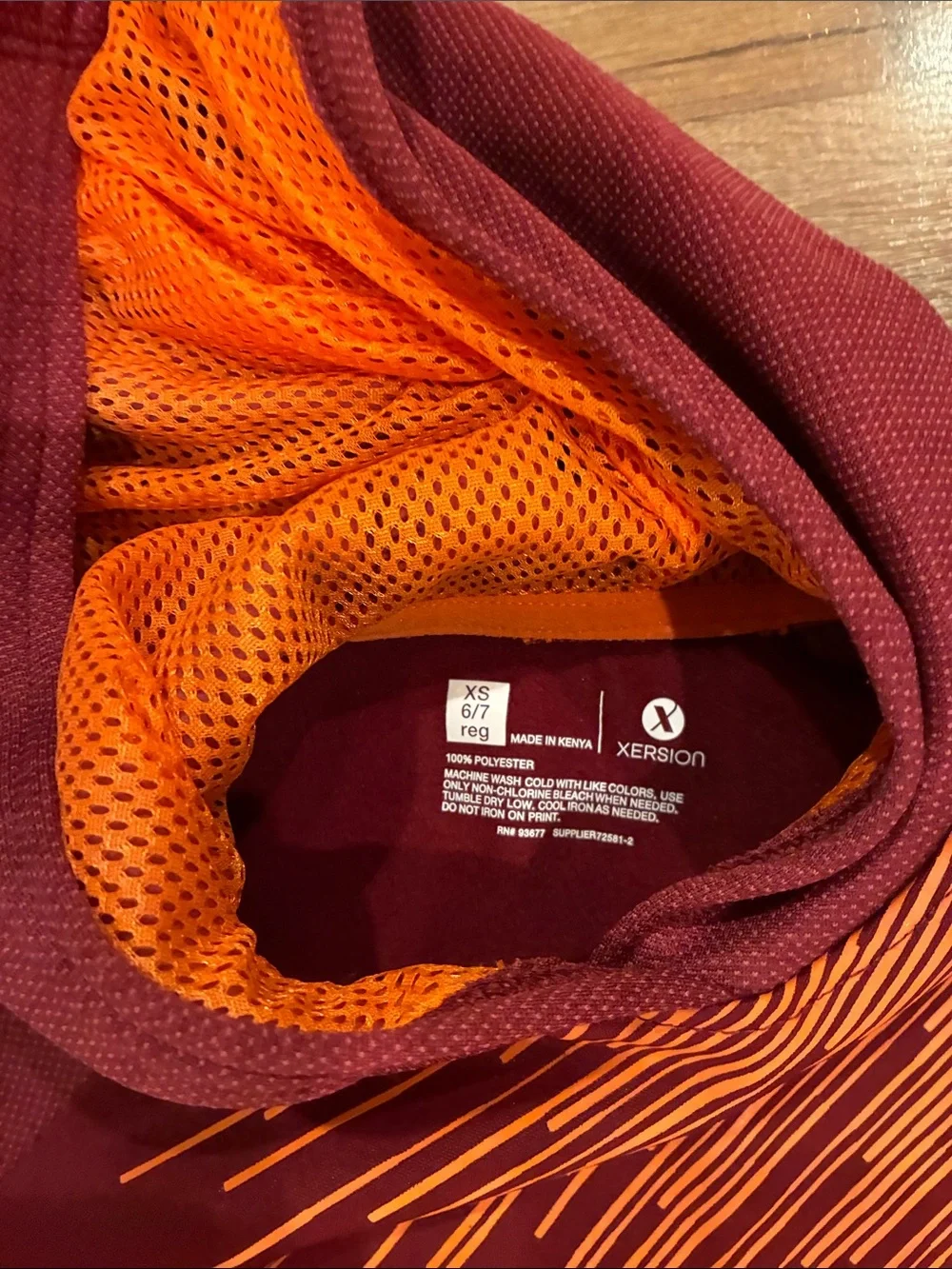 Xersion Kids Jackets & Sweatshirt - Black and Burgundy with Orange Accent